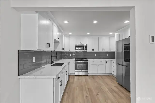 Straight on View of this "NEWLY EXPANDED Kitchen, everything new or updated.