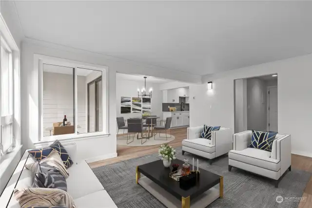 Virtually Staged.  Another beautifully staged living room with a glimpse of the dining room and balcony.