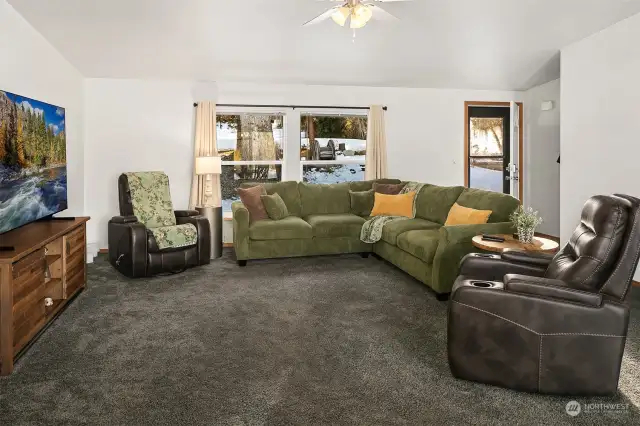 Cozy living room with fantastic views out to golf course, watch as deer and turkey walk on by...