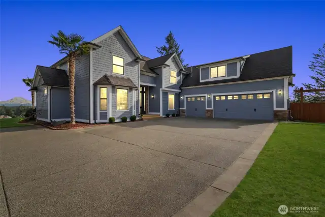 Step out of your car, and you’ll instantly feel the exceptional quality of this one-of-a-kind property. More than just a visual masterpiece, this home is designed for effortless entertaining, offering ample parking to accommodate your guests with ease.    At its heart, an impressive 900 sq. ft. three-car garage delivers the perfect combination of space, functionality, and convenience. Whether you're a car enthusiast, a dedicated hobbyist, or simply in need of generous storage, this oversized garage provides plenty of room for vehicles, tools, and equipment. A convenient double gate beside the garage allows easy access for your trailer, adding to the home’s practicality.    From the moment you arrive, the stunning surroundings and thoughtful design set the stage for an extraordinary living experience—one where beauty, comfort, and convenience come together seamlessly.