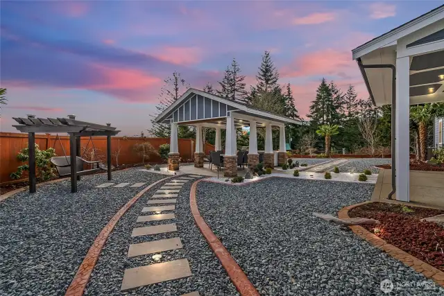Surrounded by the beautiful landscape, lighted walkways, breathtaking views of Mt. Rainier, the children's play area & the swing become a natural extension of this remarkable outdoor retreat. Here, both adults and children alike can savor moments of joy, laughter, and adventure in a setting that blends seamlessly with nature.