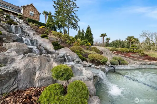 The mesmerizing waterfall feature captivates the senses, its gentle cascade delighting the eyes while soothing the soul. A true sanctuary of serenity, this tranquil oasis invites you to pause, breathe, and embrace the peaceful energy that surrounds you. You’ve just found your Zen!