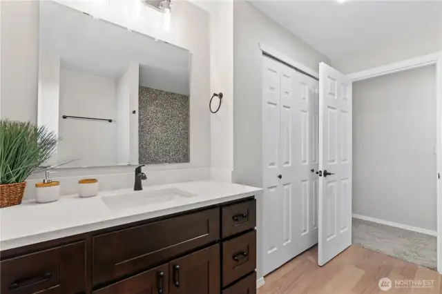 A/Main Floor: Main Bath w/New Vanity w/Quartz Counter and Custom Tiled Tub/Shower. Linen Closet, too! (Bath 2)