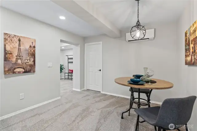 B/Lower Floor: Dining Room adjacent to the Kitchen.