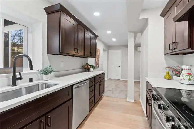 B/Lower Floor: Kitchen #2 w/Recessed Lighting. Door shown leads to Pantry/Hot Water Closet.