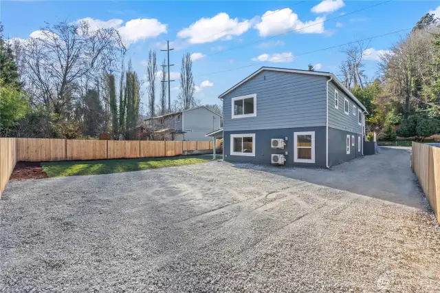 Wide View of the Parking Area, Newly created backyard. Super easy access from the main road to park back here.