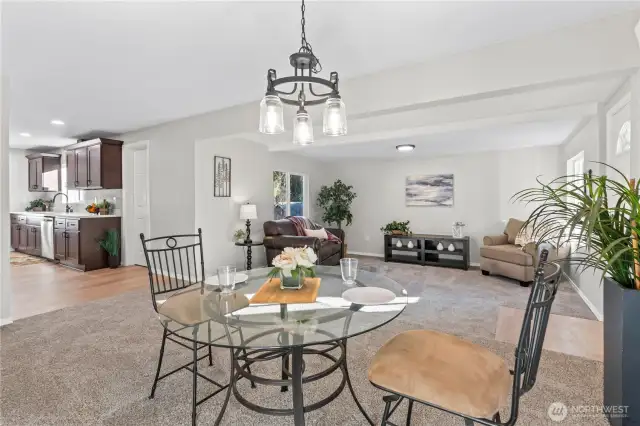 A/Main Floor: Large Dining Room w/New Lighting Fixture is adjacent to Living and Kitchen