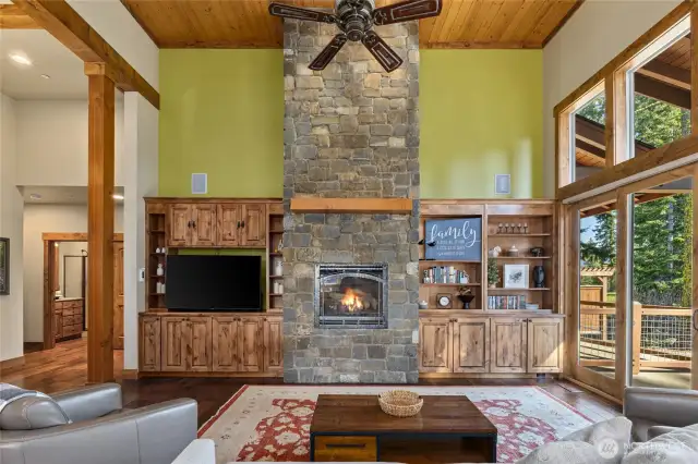 Great Room with floor to ceiling stone fireplace