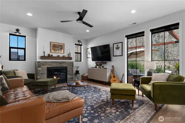 Beautiful Montana Stone fireplace w/shiplap & 8 ft windows overlooking the Columbia River