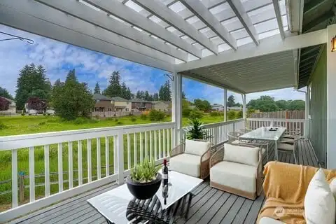 Expansive back deck is virtually staged…