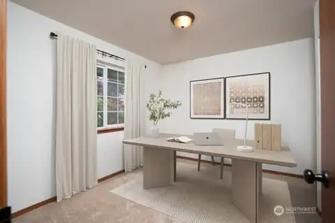 Front bedroom visually staged as a Home Office Space…