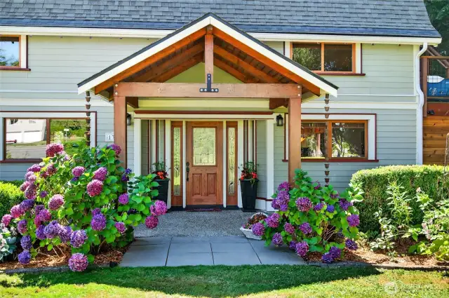 Old world charm meets modern living in this barn to home conversion with new windows, new paint inside and out.