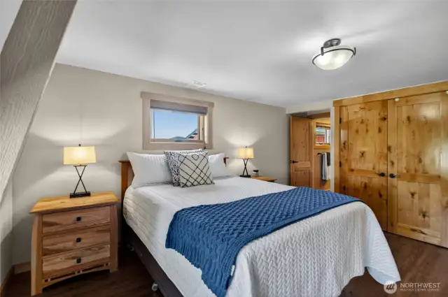 2nd story primary bedroom, with attached bathroom.  Cedar-lined closet.