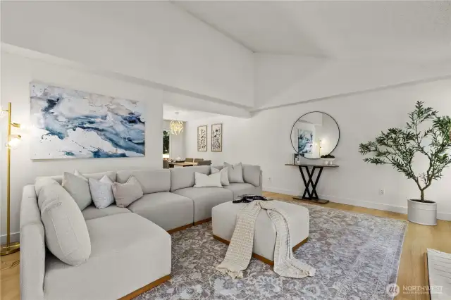 Enter to living room with wood burning fireplace