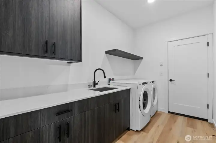Laundry room complete with washer & dryer