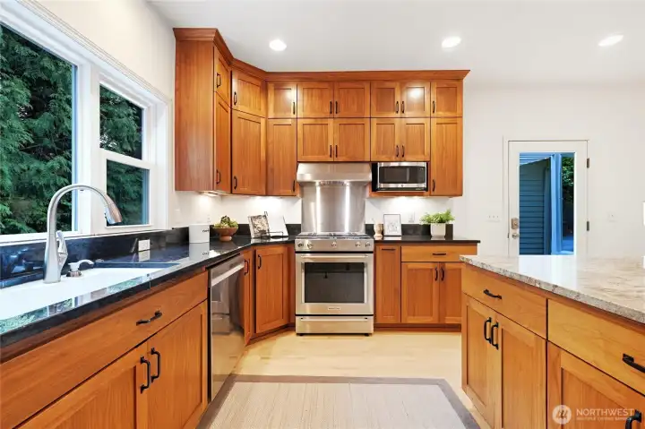 Love the ceiling-height walnut cabinetry.