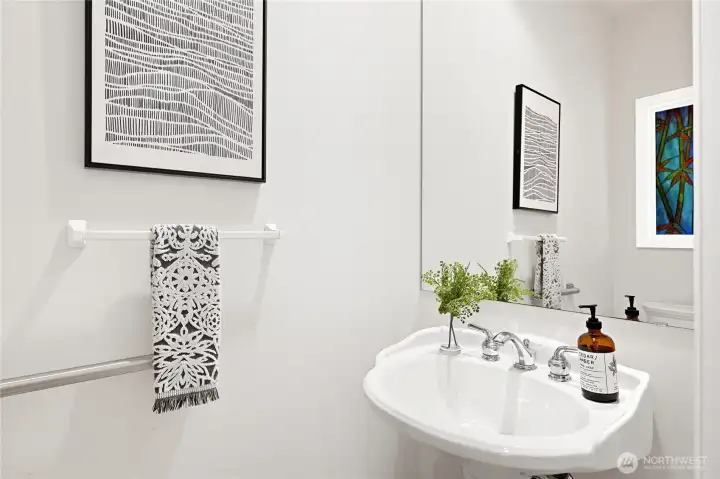 Powder room adjoins office.