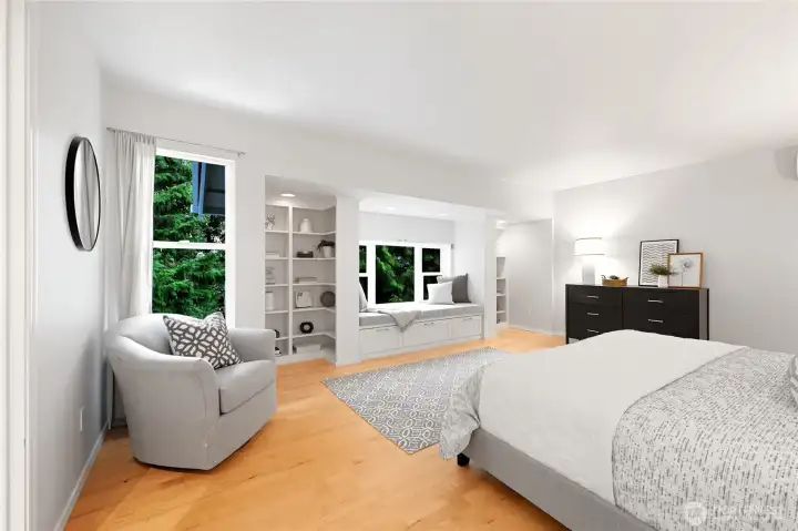Comfortable primary retreat.  Window seat, built in cabinetry, 5 piece bath and walk-in closet.