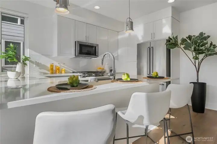 Ample seating at the breakfast bar.