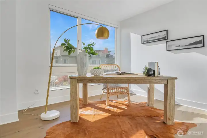 Bright flex bedroom well-suited for work, study, or guests.