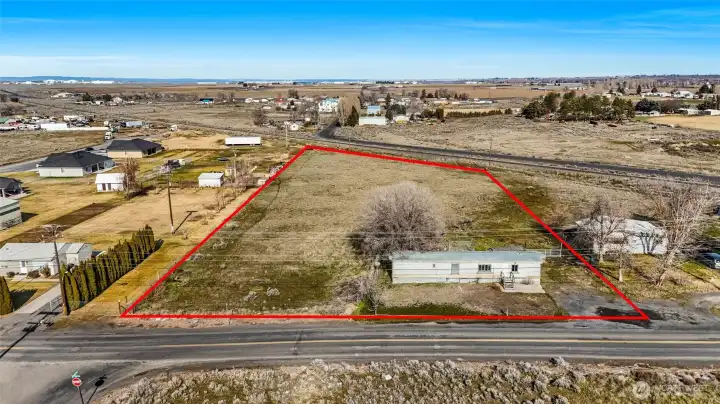 2.27 acres with a fixer upper single-wide on it.