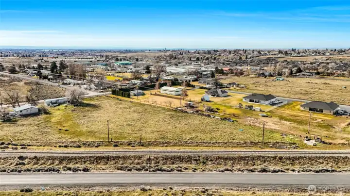Looking at the property from the other side of the RR tracks which are at the front of the picture.