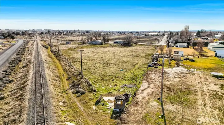 A great view of the tip of the property as it abuts the old RR tracks. An old little structure is near the property stake.