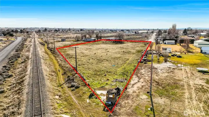 The property is a rectangle with a triangular shape on this end closest to you.  2.27 acres.