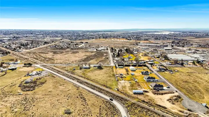 Can you find the property?  The tree that's directly in the middle of the photo is the front of the property, and we're facing the back of it. But see how close you are to town, yet out in the country?