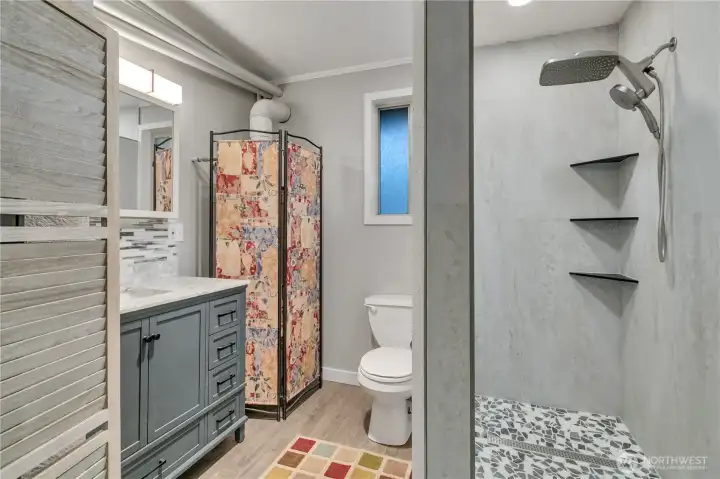 Check out the additional 3/4 bath with the custom shower pan....