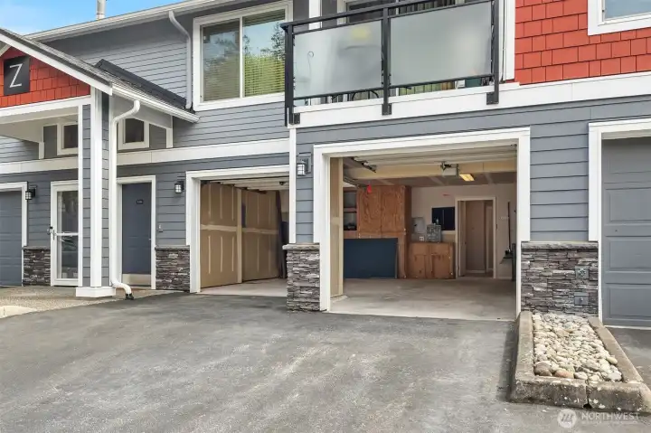 Two Car Attached Garage w/ storage allows this Condo to Live like a regular home!  Extra parking in front of each garage door.