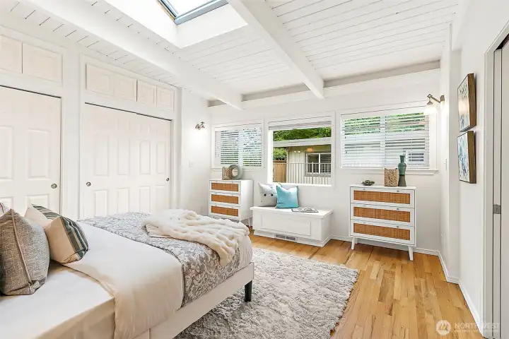 Peaceful primary retreat with abundant natural light and refined finishes.