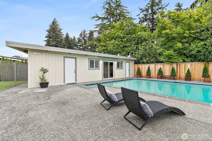 Flexible detached studio ideal for guests, office, fitness, or income potential.
