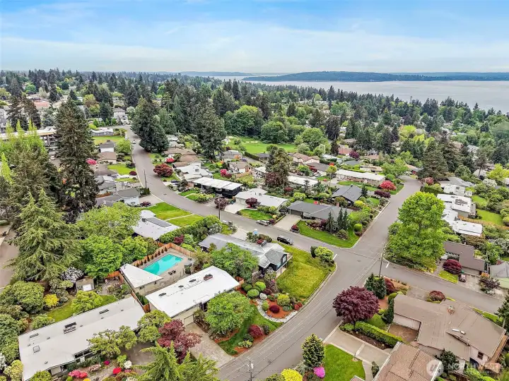 Coveted neighborhood setting with water views and exceptional privacy.