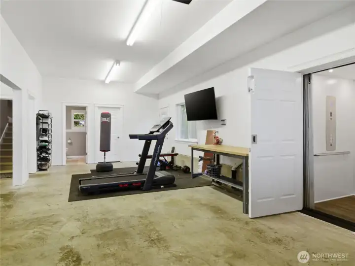 Tandem Parking, the Half Bathroom, yard access and the Elevator