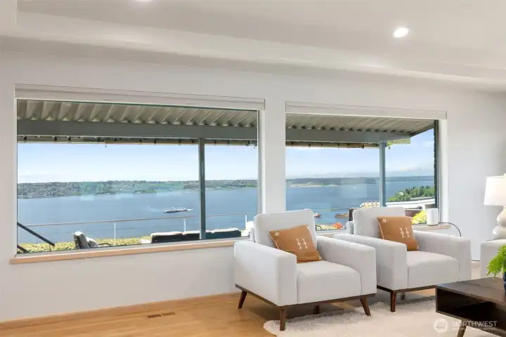 Living room looks out onto covered patio.