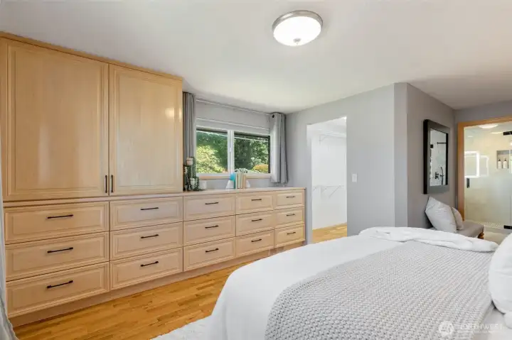 Plenty of built-in drawers, counter, and cabinets.