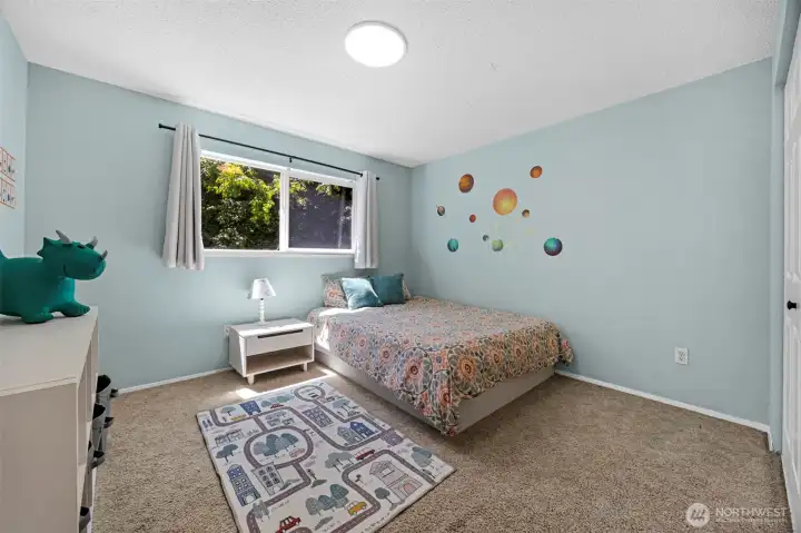 Bedroom number 2 is excellent sized. Currently has a queen bed and room for the kids to play