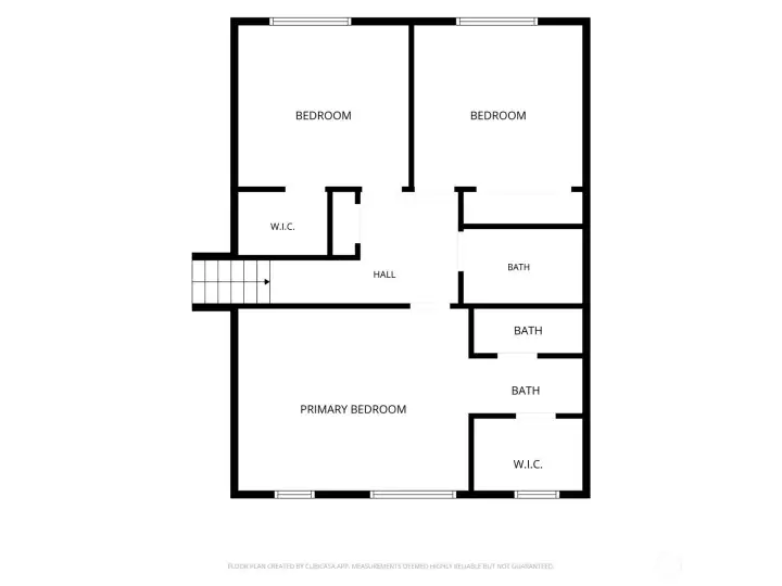 Upstairs features 3 bedrooms and 2 bathrooms