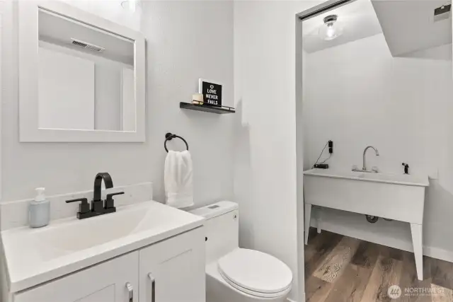 Lower level half bath with utility sink