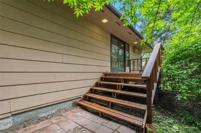 Side porch off kitchen/dining room.