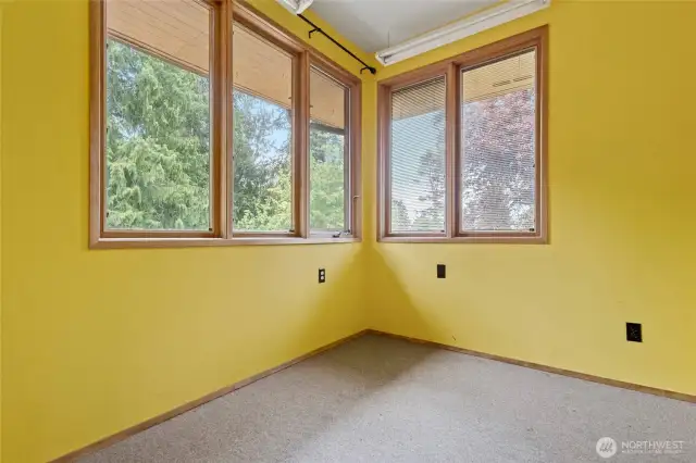 Great office or hobby room off garage.