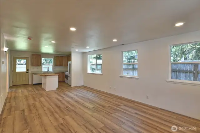 Great room concept living room open to kitchen and dining