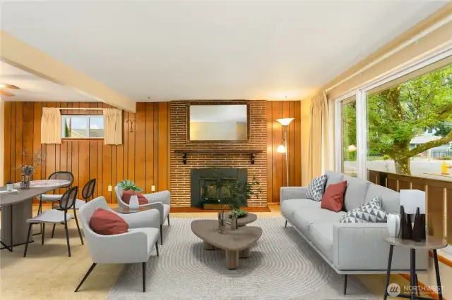 This photo is virtually staged to show a potential furniture layout in this room