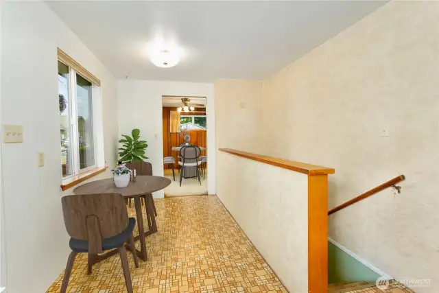 This photo is virtually staged to show a potential furniture layout in this room