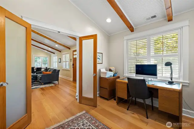 French doors open to a generous office that will make working from home a breeze.