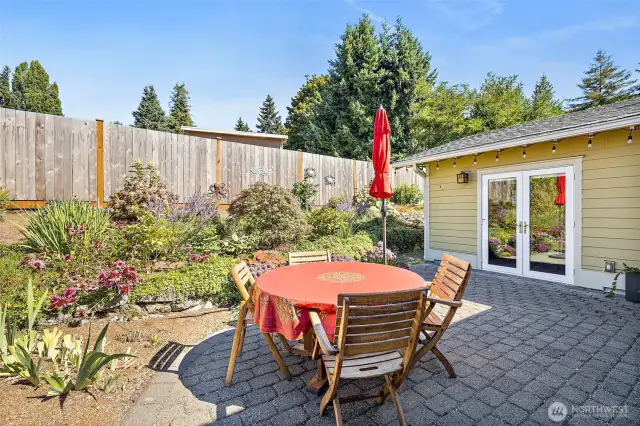 Private back yard continues with brick paver patio making this the perfect outdoor entertaining area.