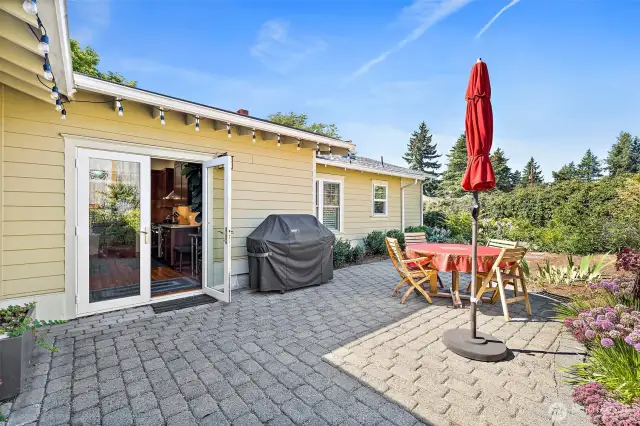 This beautiful, private patio is surrounded by lush native plantings