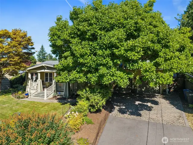 Ample driveway parking for multiple vehicles.