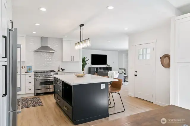 View from dining are  showing the open concept to main living area.